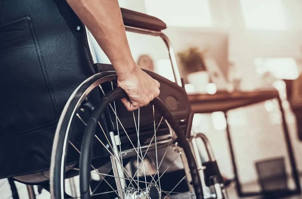Man in a Wheelchair. Concept for Long-Term Disability Claims
